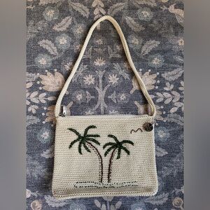 The Sak crocheted shoulder bag with a beaded palm tree design